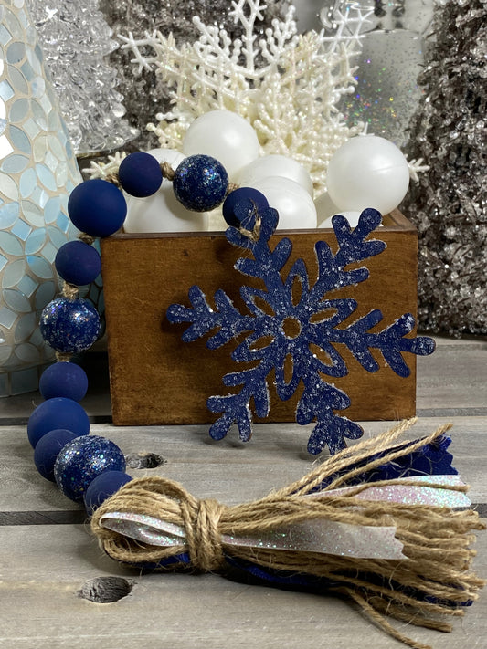 Glittered Blue Snowflake Wood Bead Garland