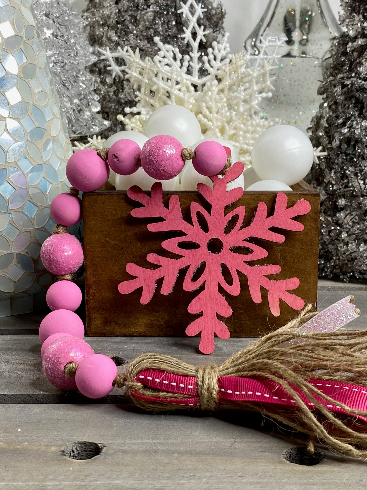 Glittered Pink Snowflake Wood Bead Garland