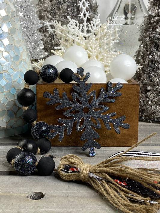 Glittered Black Snowflake Wood Bead Garland