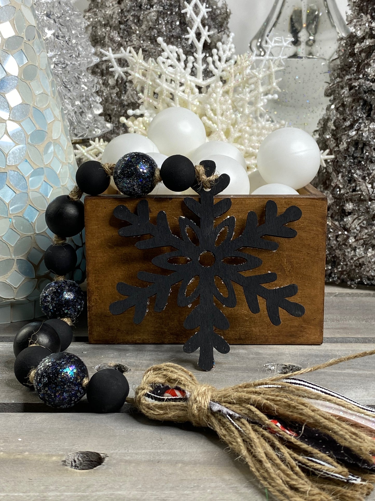 Glittered Black Snowflake Wood Bead Garland