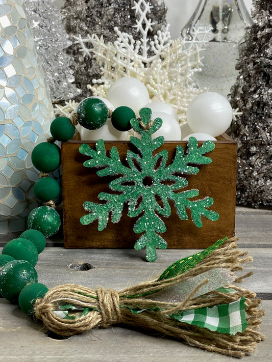 Glittered Green Snowflake Wood Bead Garland