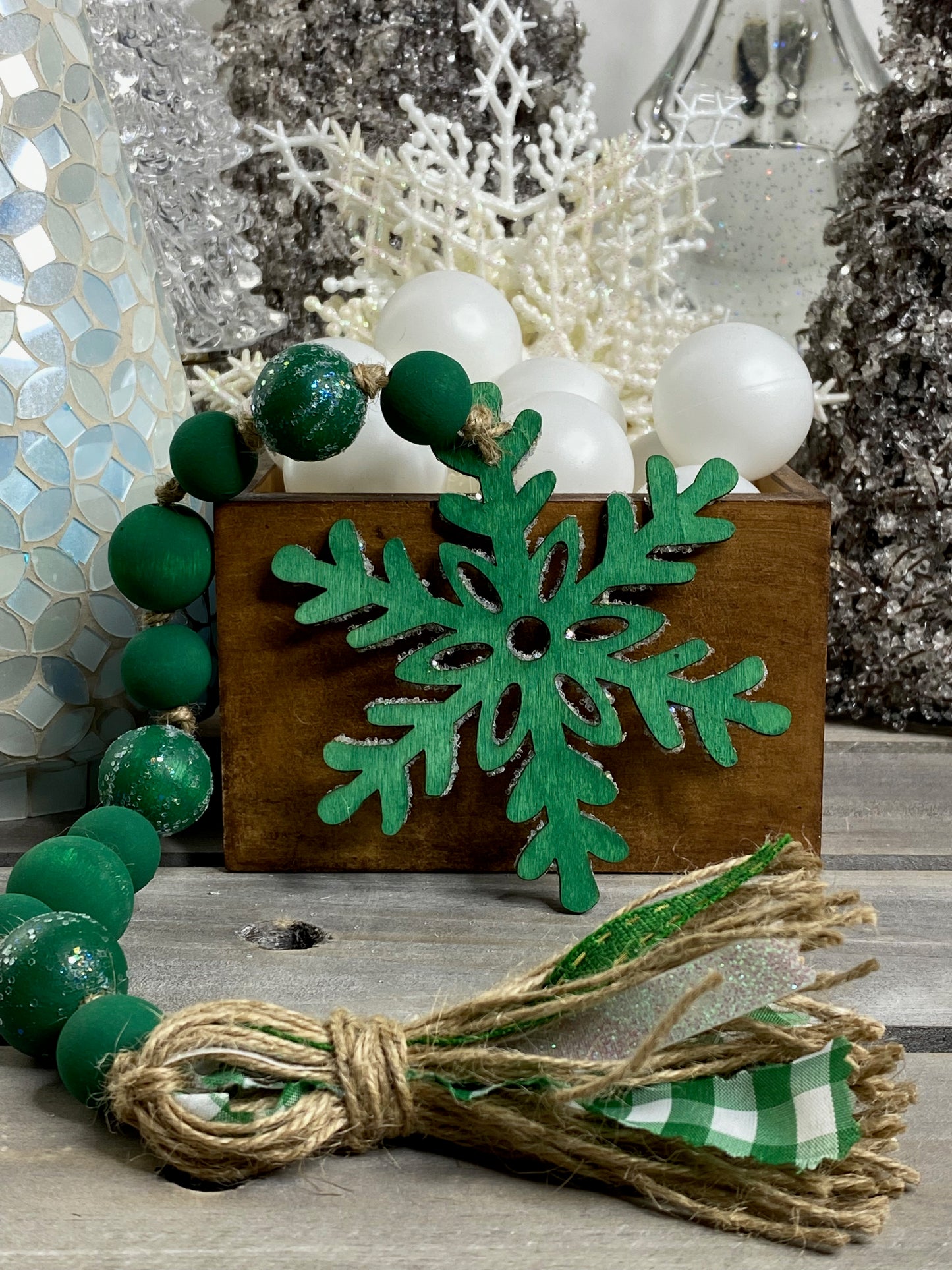 Glittered Green Snowflake Wood Bead Garland